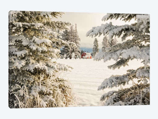 Classic red barn and snow scene, Kalispell, Montana