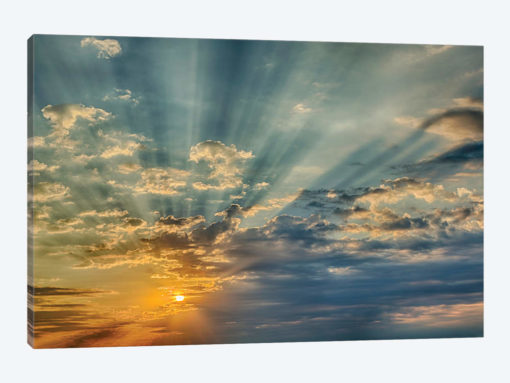 Sunbeams streaming through clouds at sunset, Cincinnati, Ohio