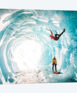 A Climber Inside A Crevasse Of Mer De Glace, Chamonix, Haute Savoie, France