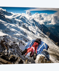 A Wingsuiter Base Jumps From Aiguille du Midi Toward Glacier des Bossons, Chamonix, France