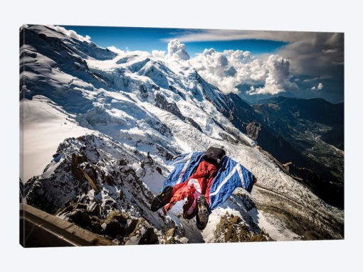 A Wingsuiter Base Jumps From Aiguille du Midi Toward Glacier des Bossons, Chamonix, France