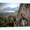 A Climber Above The Town Of Arco And Lago di Garda, Italy
