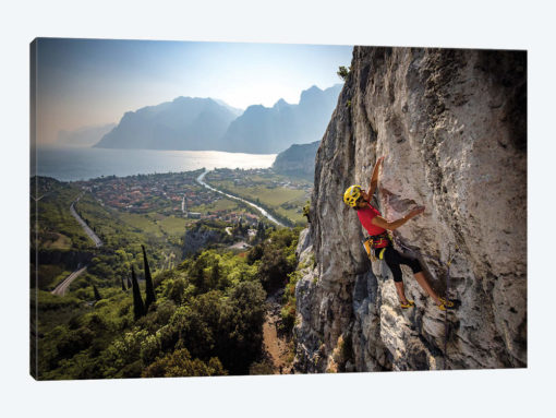 A Climber Above The Town Of Arco And Lago di Garda, Italy