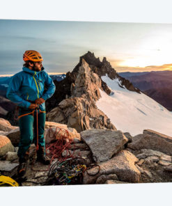 A Climber Prepares His Equipment On Aguja Guillaumet, Patagonia, Argentina