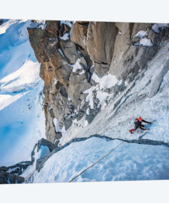 A Climber On The North Face Of Tour Ronde, Chamonix, France - I