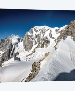 A Climber On The East Face Of Tour Ronde, Chamonix, France