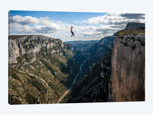 A Highliner In Verdon Gorges, Hundreds Of Meters Above The Ground, Paca, France