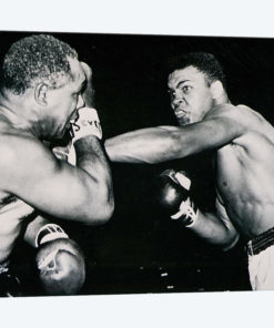 Young Cassius Clay against Archie Moore in the first round. Los Angeles, 15th November 1962
