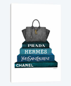 Stack Of Dark Teal And Black Fashion Books With A Yves St. Lauren Bag