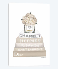 Cream, Champagne, And Silver Bookstack Topped By Vase With White Peony