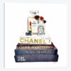 Stack Of Fashion Books With A Hint Of Gold Makeup