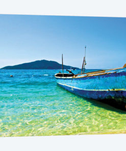 A Lone Boat On The Shore Of Cayos Cochinos, Honduras